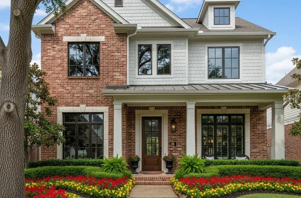 Beautiful Houston home exterior showcasing curb appeal with brick and shingle architecture, surrounded by vibrant flower beds and greenery, relevant to real estate insights in the Houston market.