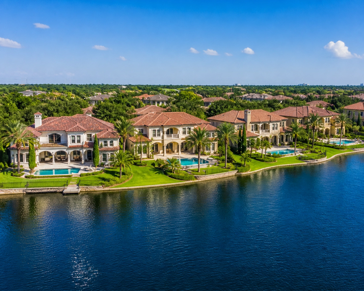 Aerial view of luxury waterfront homes in Sugar Land, Texas showcasing neighborhood stability and supply.