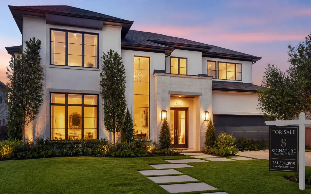 A modern Houston home at sunset with a for sale sign