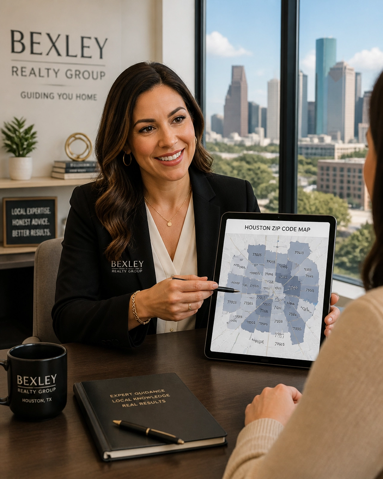 A Bexley Realty Group agent pointing at a digital tablet showing a map of Houston divided by ZIP codes