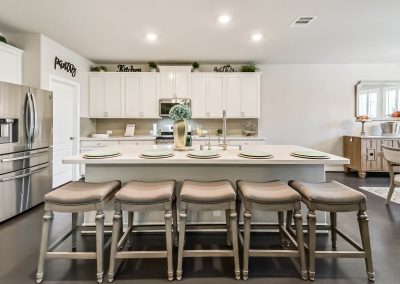 Modern kitchen island and bar stools in Katy, Texas property listing