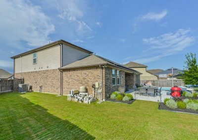 Featured Katy Texas home with backyard pool and patio.
