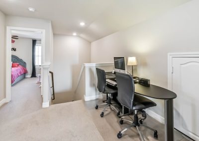 Featured Katy Texas property with dedicated home office space and desks.