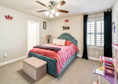 Bedroom interior in Katy, Texas property listing by Bexley Realty Group.