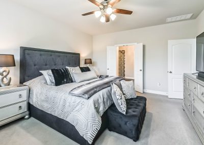 Luxurious bedroom in Katy, Texas property for sale by Bexley Realty Group.