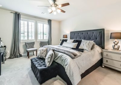 Luxurious bedroom in Katy, Texas property listing by Bexley Realty Group.