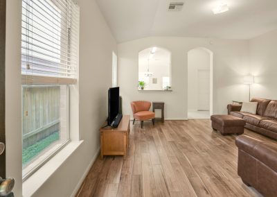 Interior view of Katy, Texas home for sale and living room with window and furniture