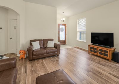 Living room interior of a Katy, Texas property for sale by Bexley Realty Group.