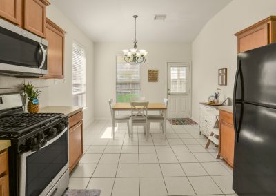 Kitchen and dining area in Katy, Texas home for sale by Bexley Realty Group.