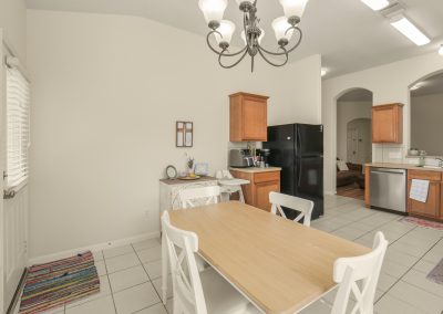 Dining area in Katy Texas home for sale with kitchen and appliances
