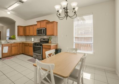 Kitchen and dining area in Katy, Texas home for sale by Bexley Realty Group.
