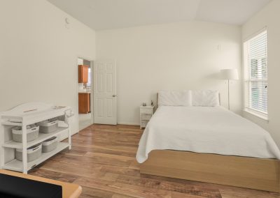 Bright bedroom interior in Katy, Texas property for sale by Bexley Realty Group.