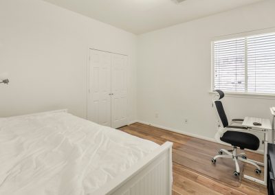 Bedroom interior with window and desk in Katy, Texas property listing