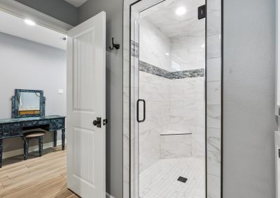 Luxurious bathroom shower detail in Galveston, Texas property for sale by Bexley Realty Group.