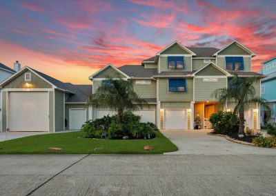 Luxury home for sale in Galveston, Texas with vibrant sunset sky